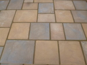 Patio pressure washed and repointed.