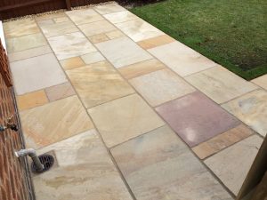 A close up view of the finished Indian Sandstone patio in Kettering.