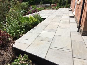 Close up of the completed Indian Sandstone patio in Broughton.