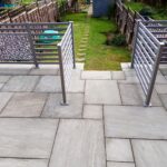 The completed raised patio with gates