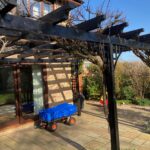 The client requested the painting of their pergola