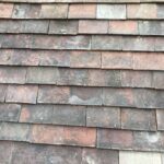The restored roof at the condemned building, after the chimney had been removed.