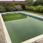 Full view of the new copings on the pool of the listed building