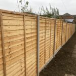 New fence panels on the building plot site clearance